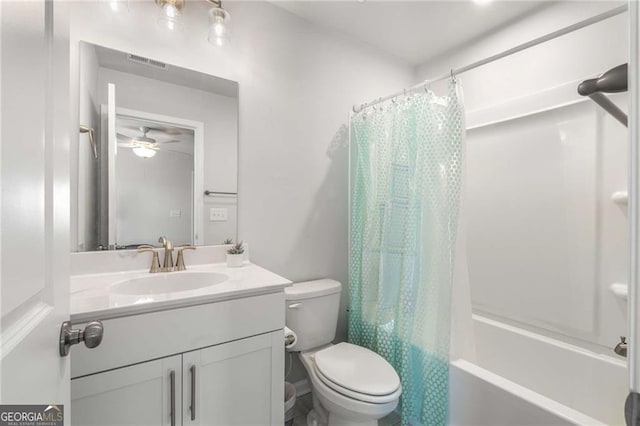 bathroom featuring shower / tub combo, visible vents, toilet, ceiling fan, and vanity