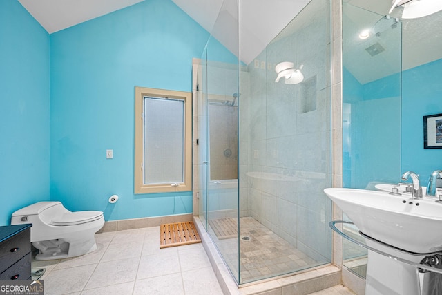 bathroom with lofted ceiling, a stall shower, tile patterned flooring, and toilet