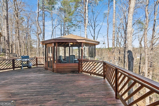 wooden terrace with a gazebo