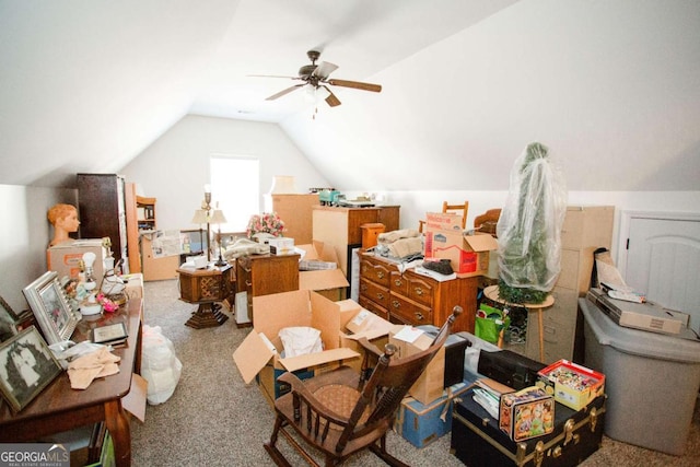 bonus room featuring lofted ceiling, carpet floors, and a ceiling fan