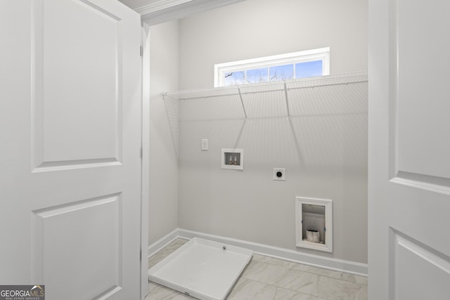 laundry area featuring marble finish floor, laundry area, washer hookup, and hookup for an electric dryer