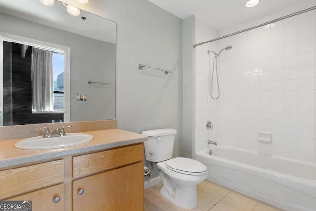 full bath with shower / washtub combination, vanity, toilet, and tile patterned floors