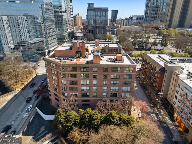 birds eye view of property featuring a city view