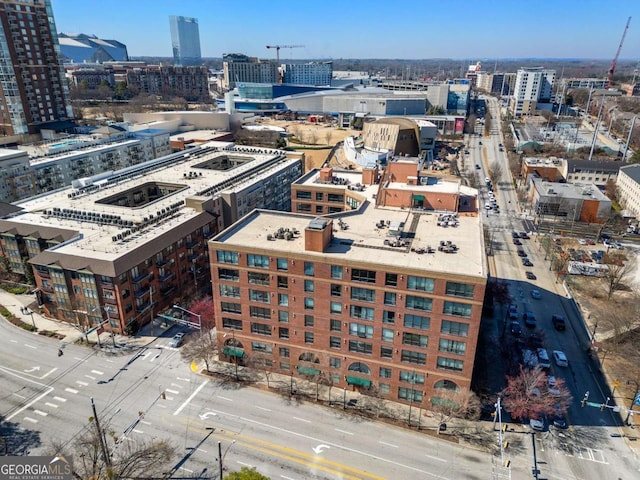 birds eye view of property with a city view