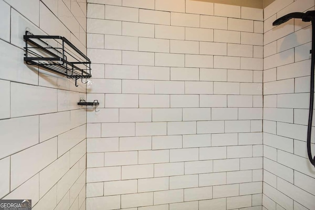 full bath featuring tiled shower