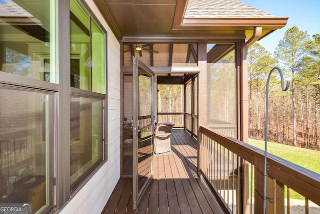 wooden terrace with a sunroom