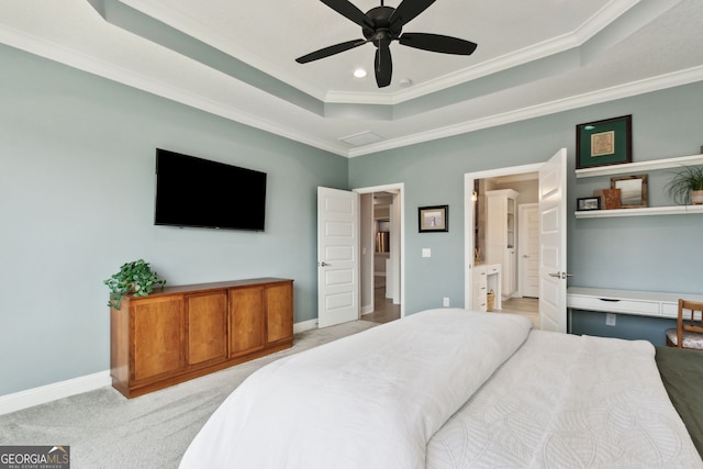 bedroom featuring light carpet, baseboards, ornamental molding, a tray ceiling, and recessed lighting