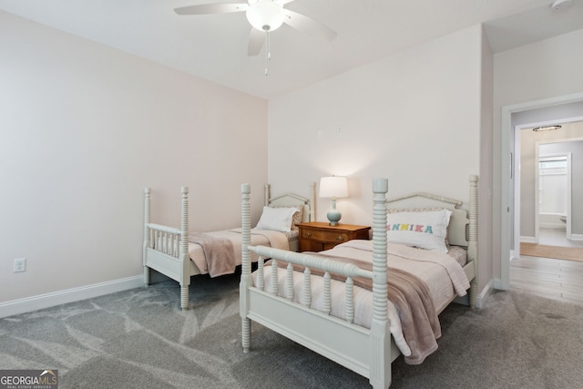 bedroom featuring ceiling fan, carpet flooring, and baseboards