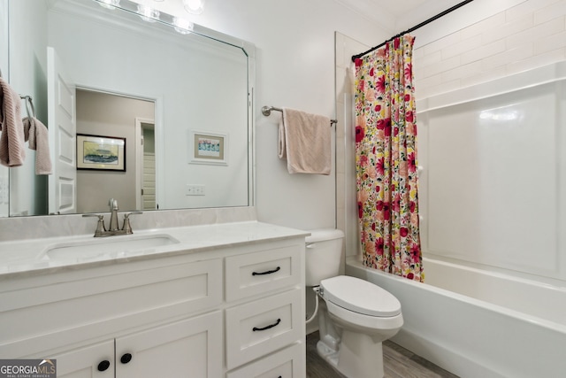 bathroom featuring vanity, wood finished floors, shower / bath combination with curtain, and toilet