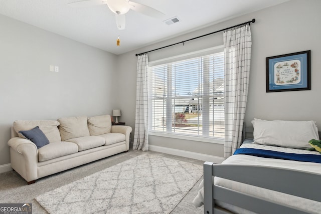 bedroom with a ceiling fan, carpet, visible vents, and baseboards