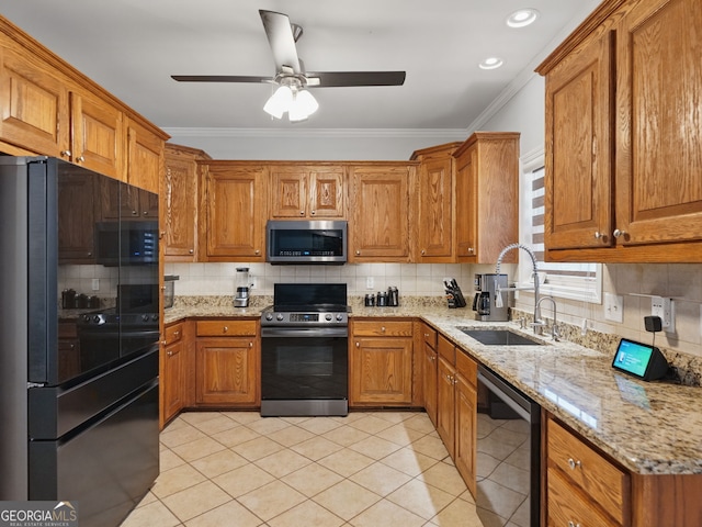 kitchen with a sink, freestanding refrigerator, electric range oven, stainless steel microwave, and dishwasher