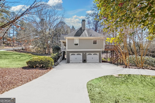 view of property exterior with a garage, driveway, a lawn, a chimney, and stairway