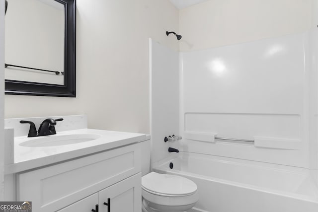 full bath featuring shower / tub combination, vanity, and toilet