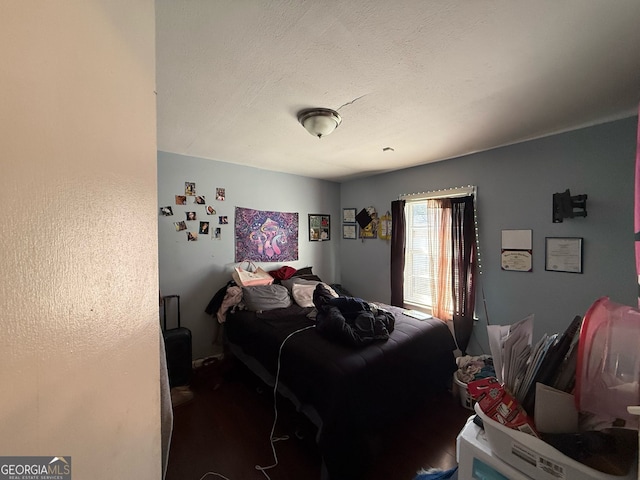 bedroom featuring a textured ceiling