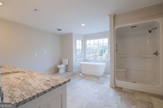 bathroom with visible vents, vanity, baseboards, a soaking tub, and walk in shower