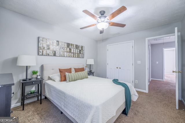 bedroom featuring carpet, a closet, visible vents, attic access, and baseboards