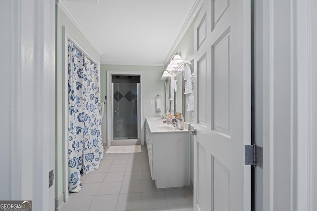 full bathroom with tile patterned floors, a stall shower, ornamental molding, and vanity