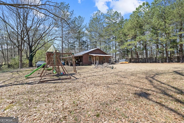 view of yard with a playground