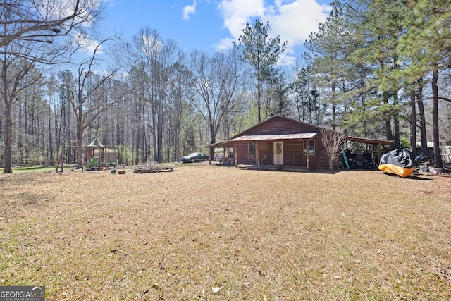 view of yard featuring a porch