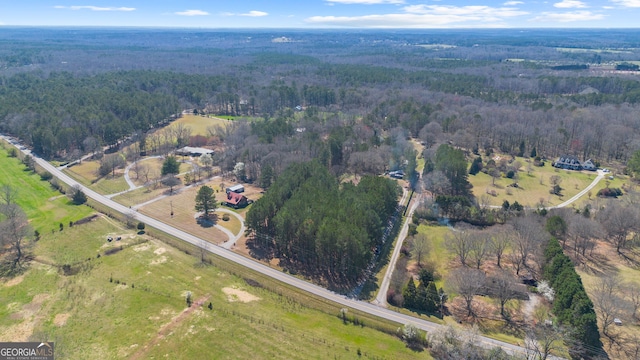 bird's eye view with a forest view and a rural view