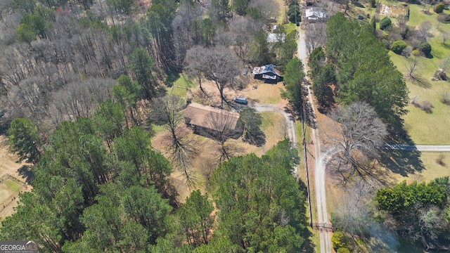 aerial view featuring a forest view