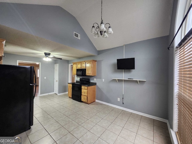 kitchen featuring light tile patterned floors, dark countertops, visible vents, black appliances, and ceiling fan with notable chandelier