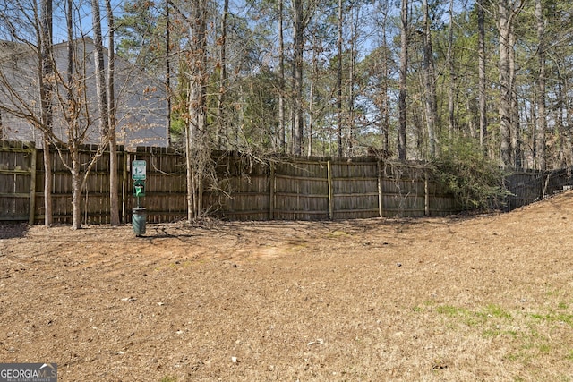 view of yard featuring fence