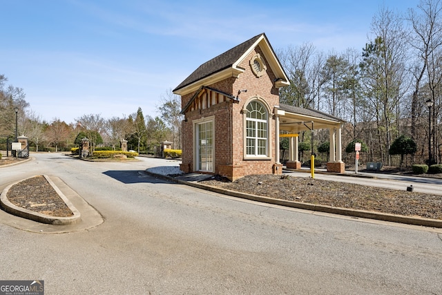 exterior space with brick siding