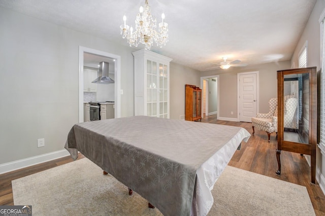 recreation room with ceiling fan, billiards, baseboards, and wood finished floors