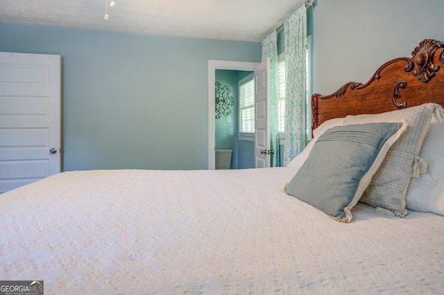 bedroom with ensuite bathroom