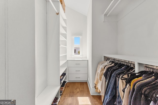 walk in closet featuring light wood-style flooring