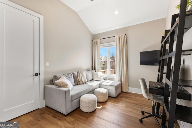 office with vaulted ceiling, recessed lighting, wood finished floors, and baseboards