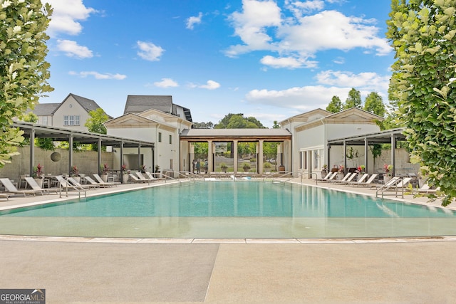 pool with a patio area