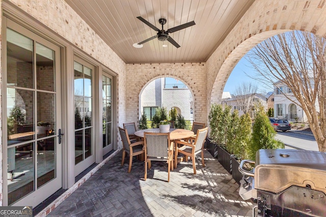 view of patio / terrace with ceiling fan, outdoor dining space, and grilling area