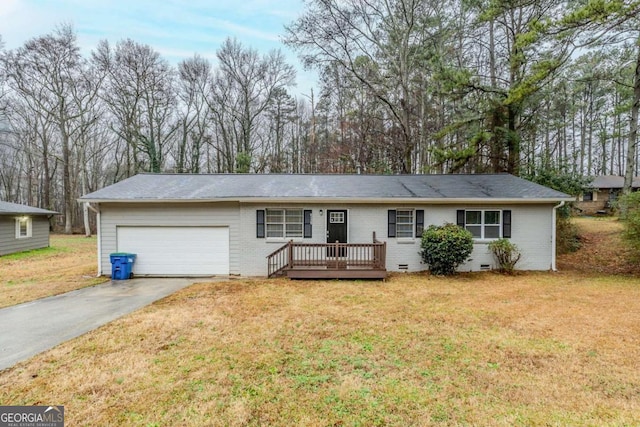 ranch-style house featuring brick siding, a front yard, crawl space, a garage, and driveway