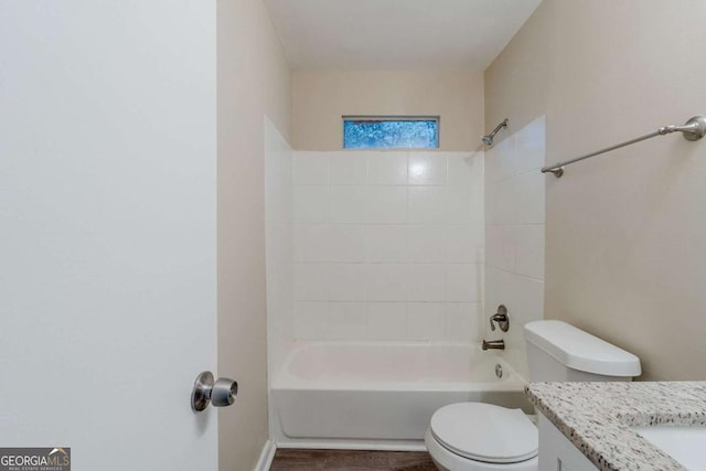 full bathroom with toilet, bathing tub / shower combination, and vanity