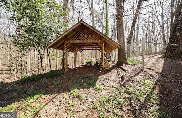 exterior space with a carport and driveway