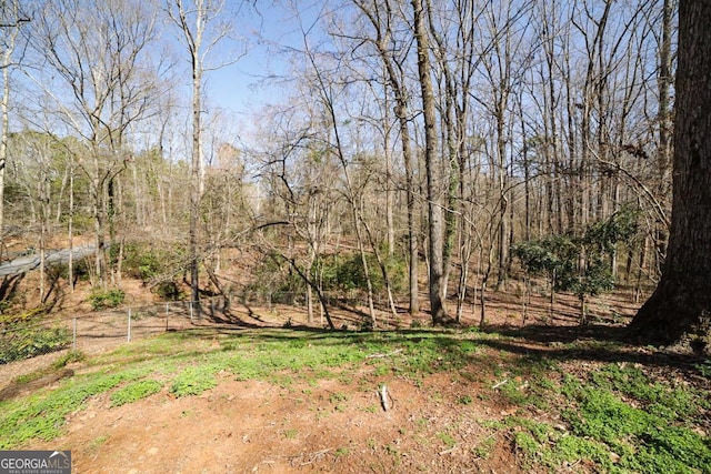 view of local wilderness with a view of trees