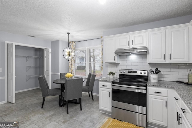 kitchen featuring white cabinets, electric range, visible vents, and under cabinet range hood