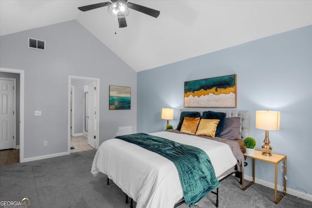 carpeted bedroom with high vaulted ceiling, visible vents, baseboards, and a ceiling fan