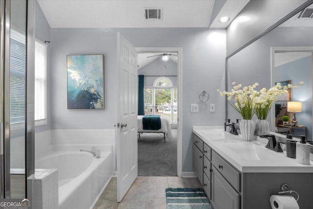 bathroom featuring visible vents, a sink, and ensuite bathroom