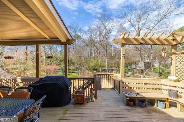 wooden deck with grilling area