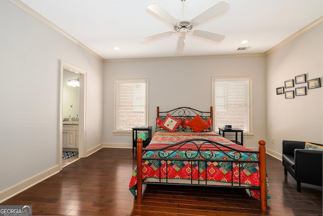 bedroom with ornamental molding, hardwood / wood-style flooring, visible vents, and baseboards