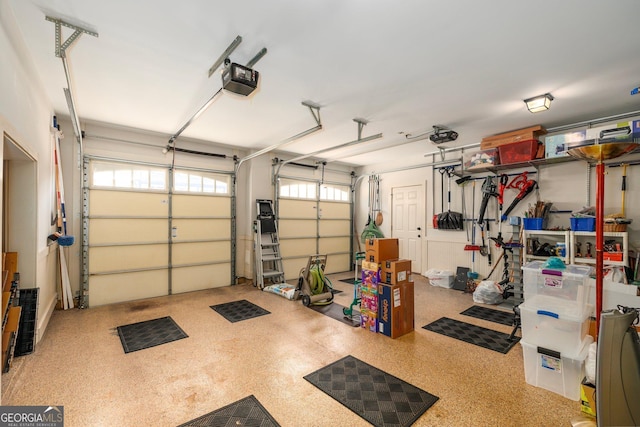 garage featuring a garage door opener