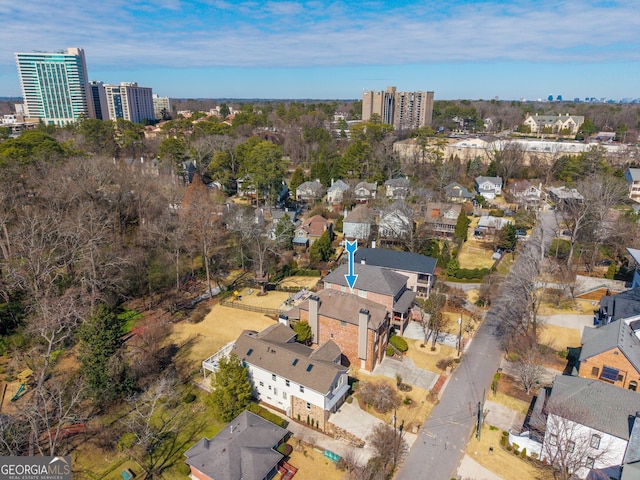 drone / aerial view featuring a city view