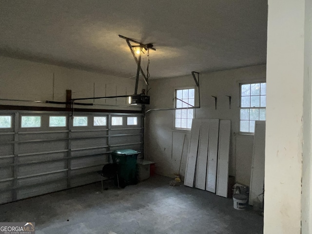 garage featuring a garage door opener