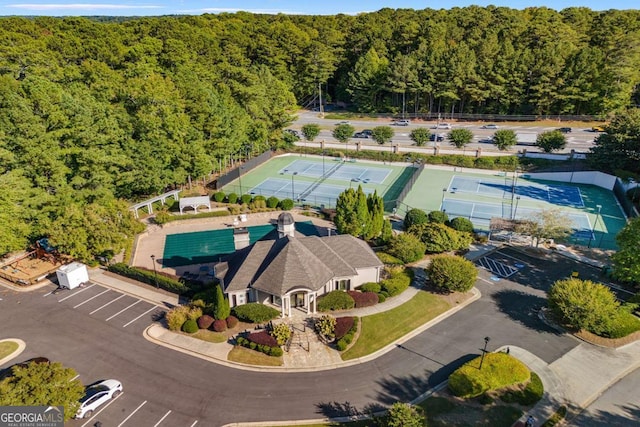 drone / aerial view featuring a view of trees