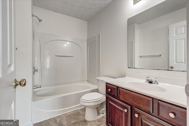 full bathroom with a textured ceiling, shower / bath combination, vanity, and toilet