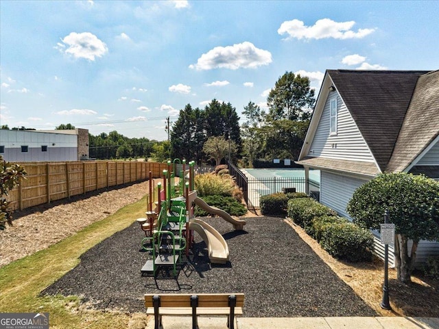 view of play area with fence