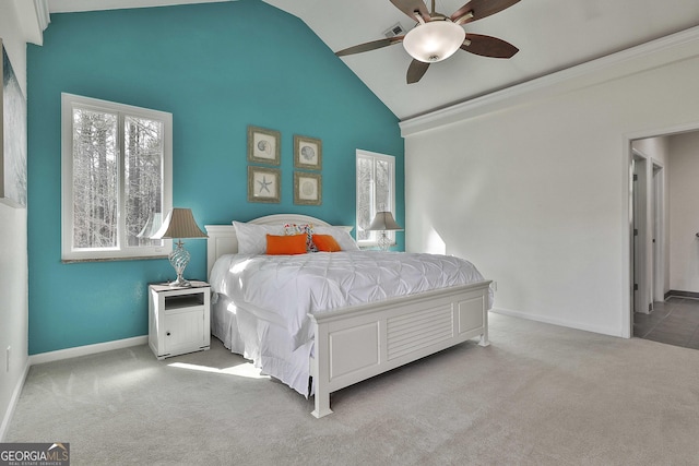 bedroom featuring baseboards, visible vents, vaulted ceiling, and carpet flooring